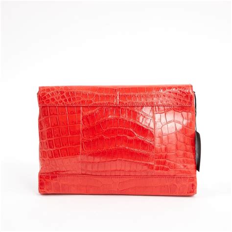 red croc clutch bag